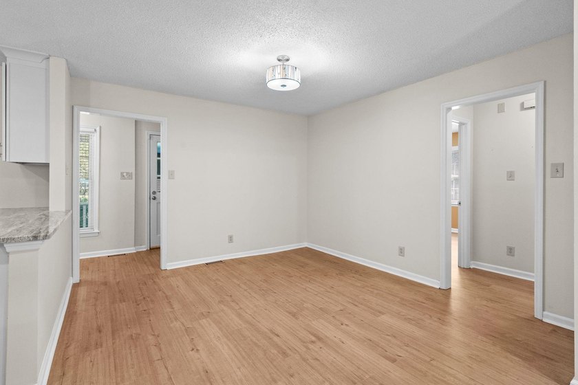 Nestled on a large, shaded 0.48-acre corner lot in the heart of - photo 19