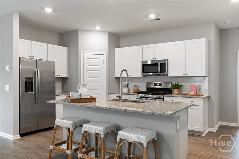 This single-story Harrisburg home design features three bedrooms - photo 3
