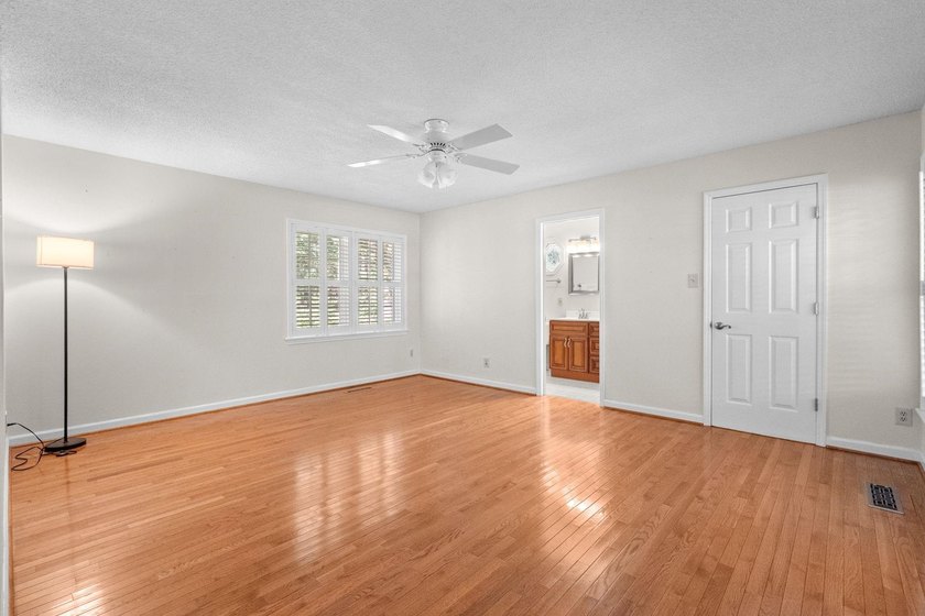 Nestled on a large, shaded 0.48-acre corner lot in the heart of - photo 24