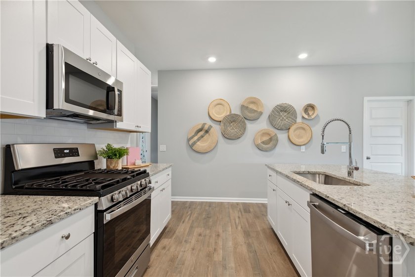 This single-story Harrisburg home design features three bedrooms - photo 4