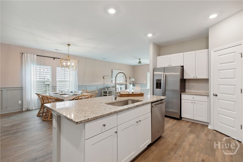 This single-story Harrisburg home design features three bedrooms - photo 5