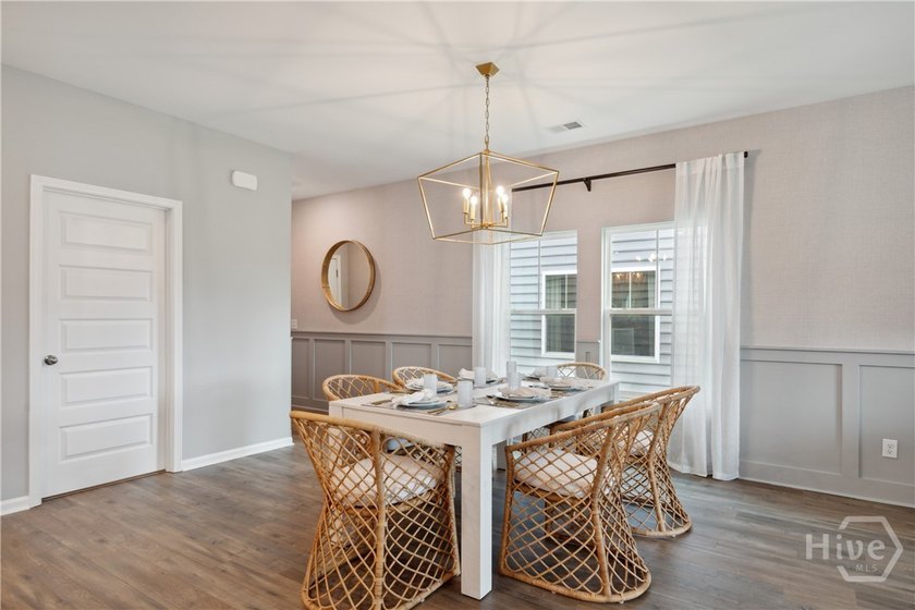 This single-story Harrisburg home design features three bedrooms - photo 6