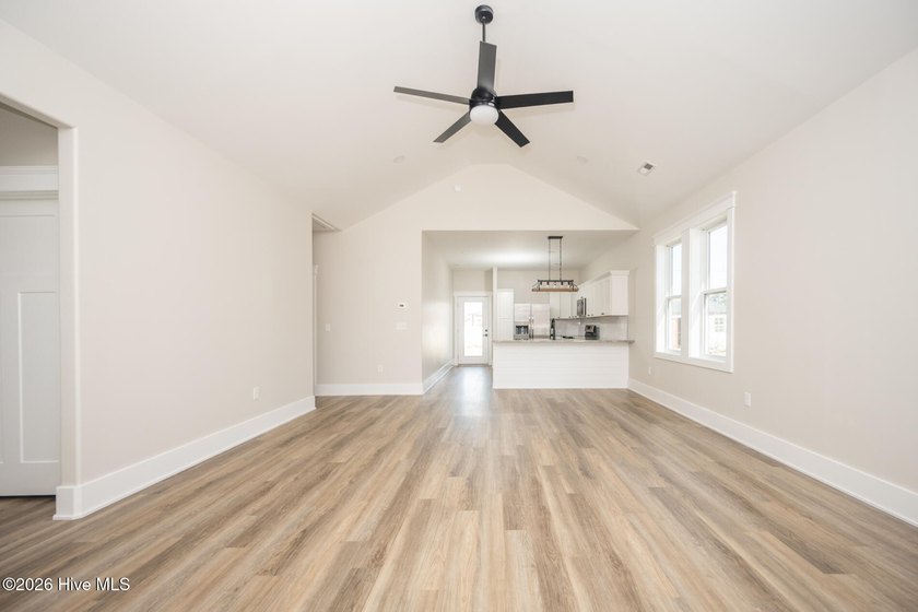 New construction home featuring 3 bedrooms and 2 bathrooms with - photo 3