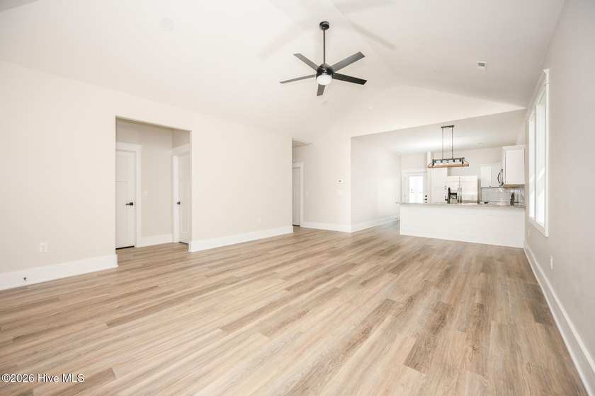 New construction home featuring 3 bedrooms and 2 bathrooms with - photo 4