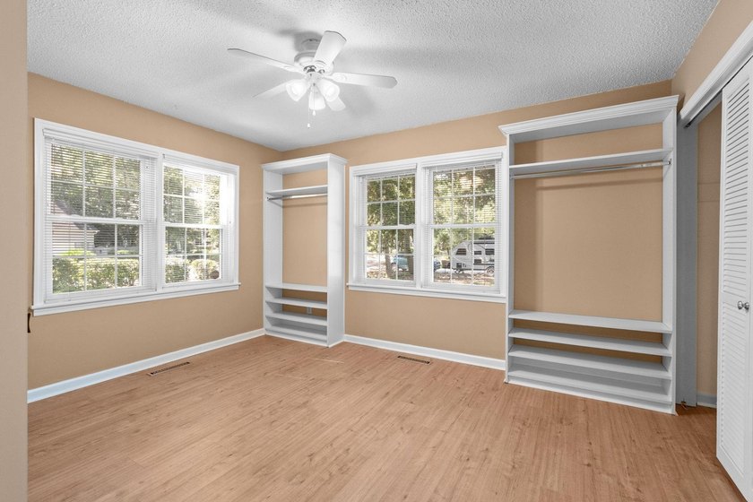 Nestled on a large, shaded 0.48-acre corner lot in the heart of - photo 35