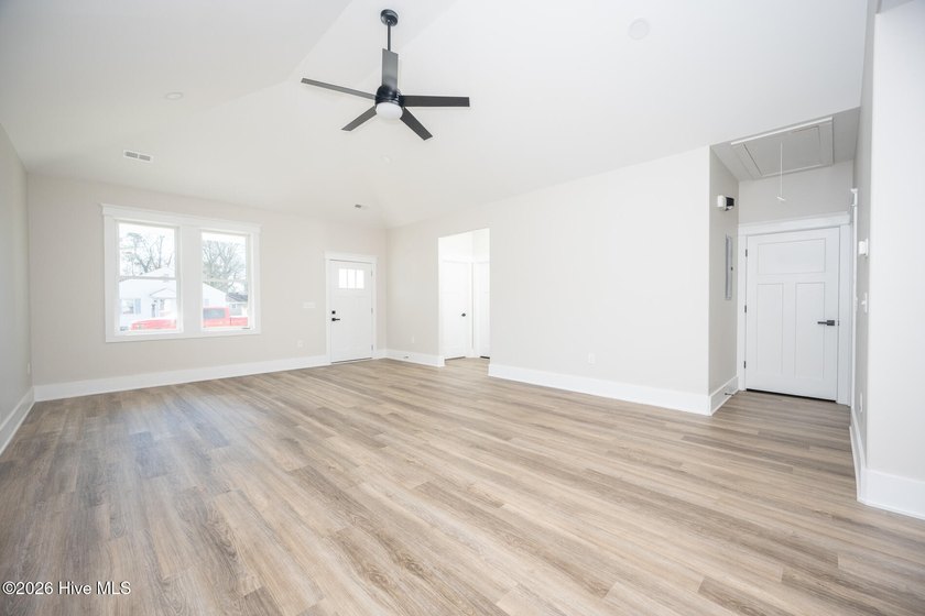 New construction home featuring 3 bedrooms and 2 bathrooms with - photo 6