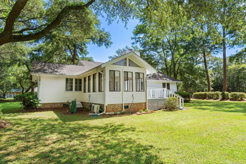 Nestled on a large, shaded 0.48-acre corner lot in the heart of - photo 43