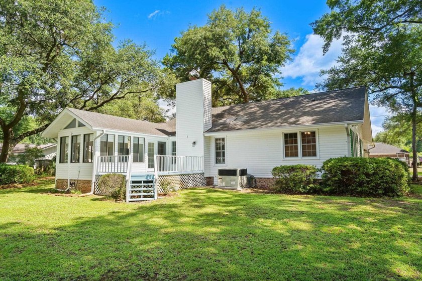 Nestled on a large, shaded 0.48-acre corner lot in the heart of - photo 45