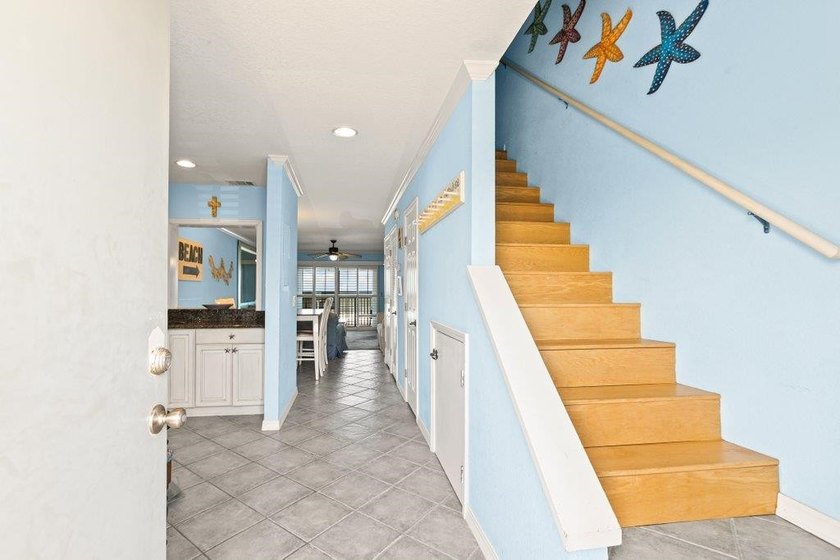 Experience the ultimate beachfront lifestyle in this stunning - photo 2