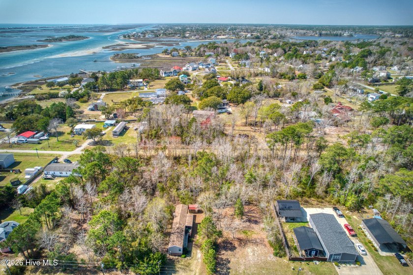 This nearly half-acre wooded lot in Snug Harbor offers the - photo 7