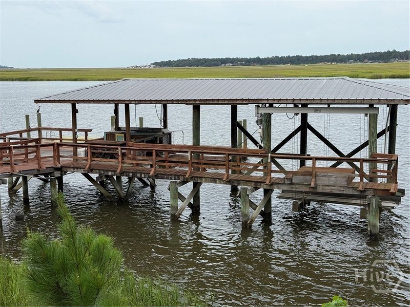 SAPELO RIVER .87 ACRE DEEP WATER LOT WITH DOCK AND TWO SHEDS - photo 6