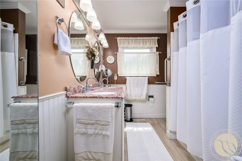 One-level living with no steps in this beautifully updated - photo 8