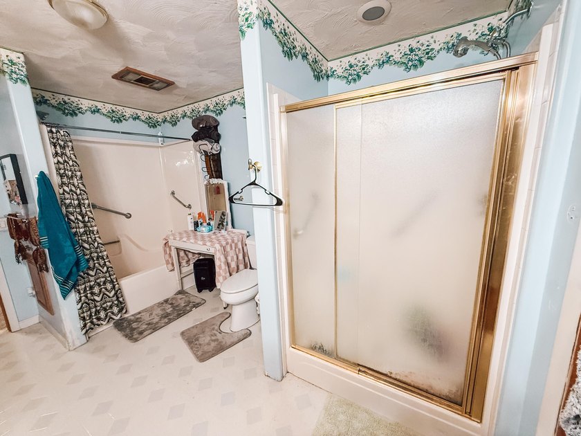 Welcome to this charming two-bedroom, two-bathroom residence in - photo 21