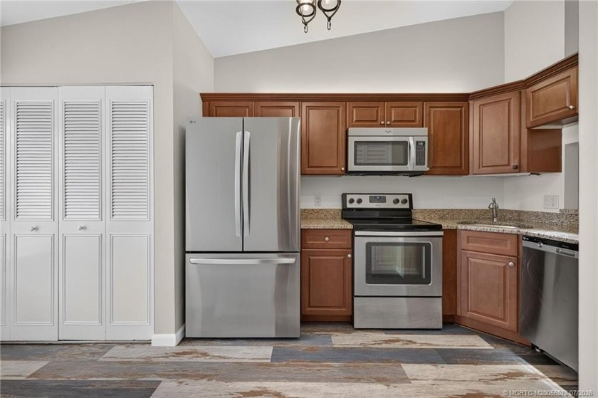 Beautifully updated villa in the centrally located community of - photo 11