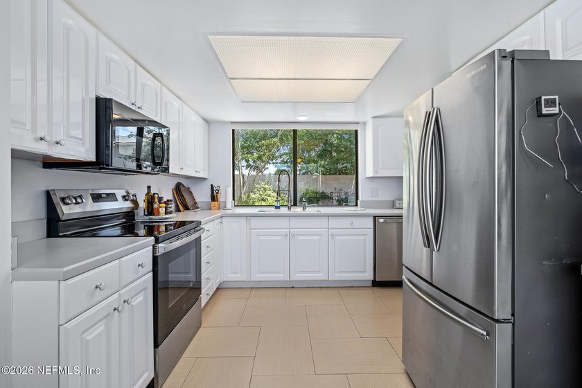 2445 Lorraine Court N is a 1,186 sq ft, 3 full bedroom, 3 full - photo 13