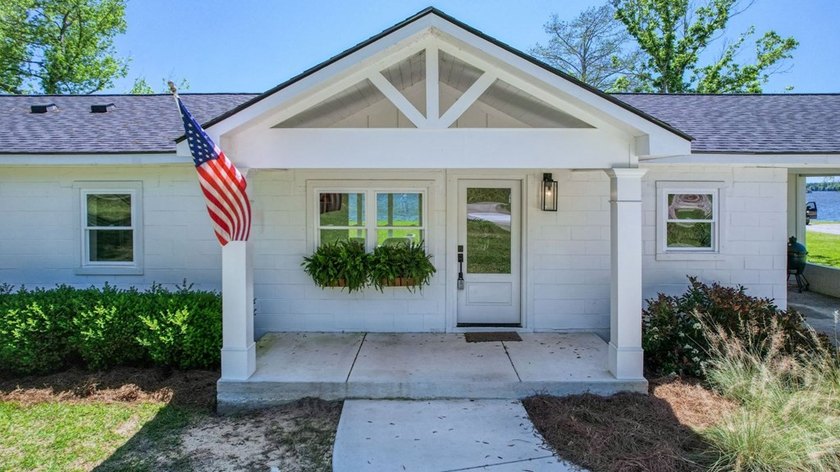 This Lake Home is truly a rare gem! Nestled along 165 Feet of - photo 10
