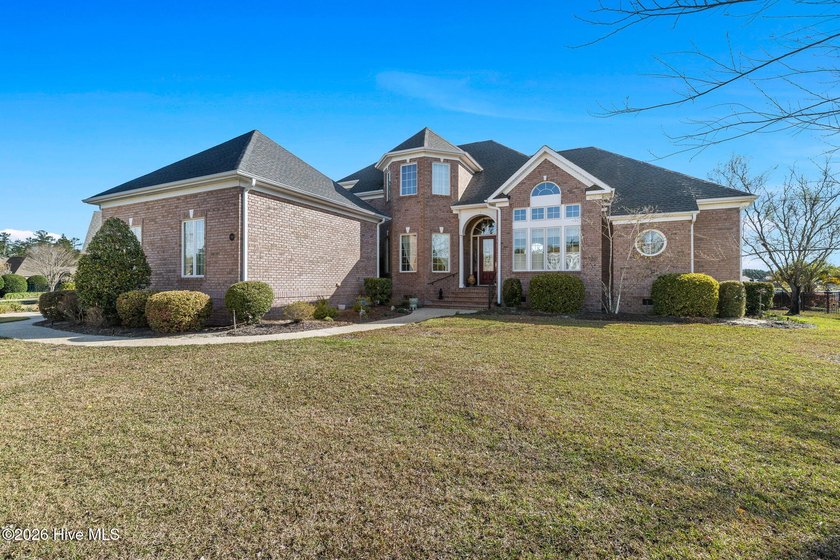 Welcome to this stunning all-brick home in the highly - photo 2