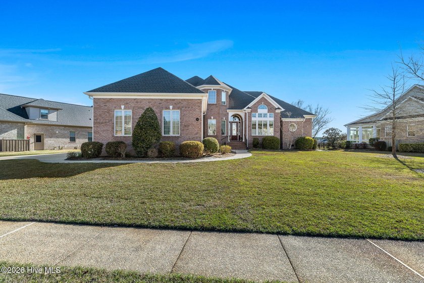 Welcome to this stunning all-brick home in the highly - photo 3