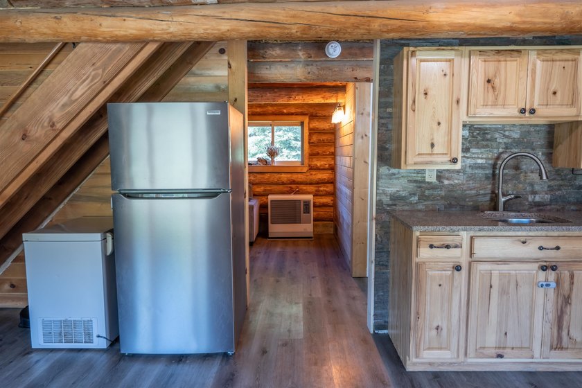 Cozy doesn't have to mean compromising, and this 1,110 square - photo 8