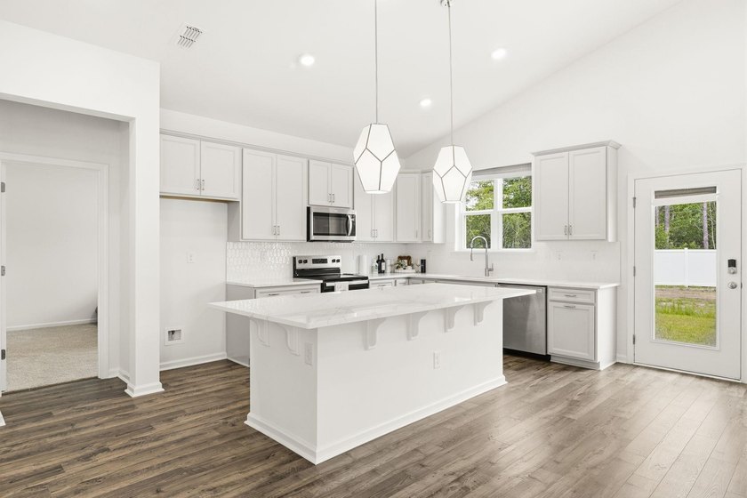 Welcome to 8663 Farrier Drive in the highly sought-after - photo 11