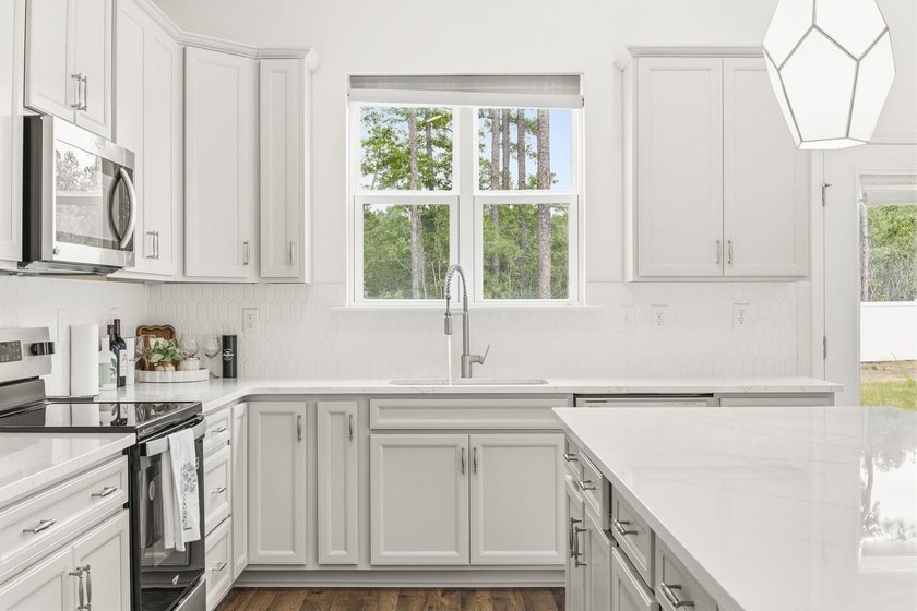 Welcome to 8663 Farrier Drive in the highly sought-after - photo 13