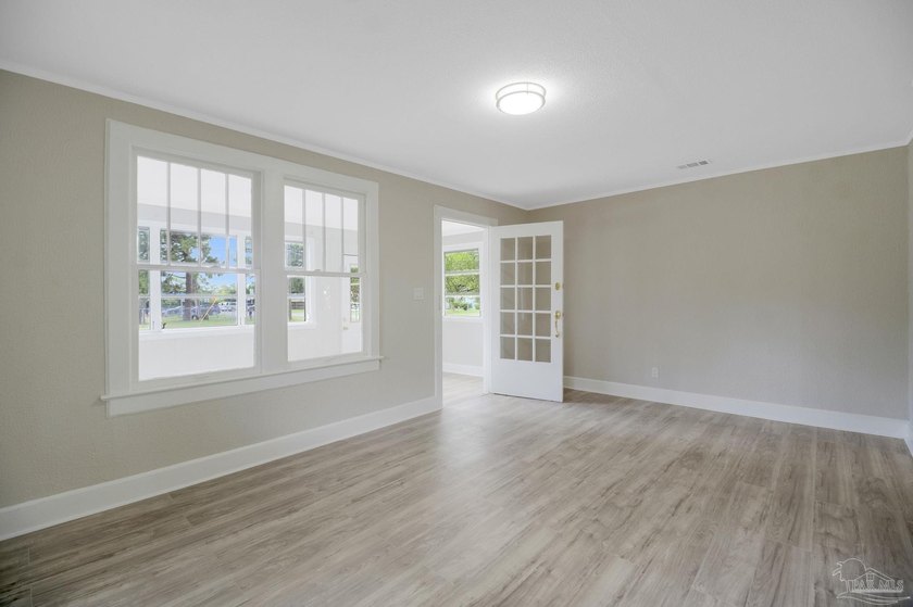 Completely renovated and move-in ready. This 3-bedroom, 1-bath - photo 12