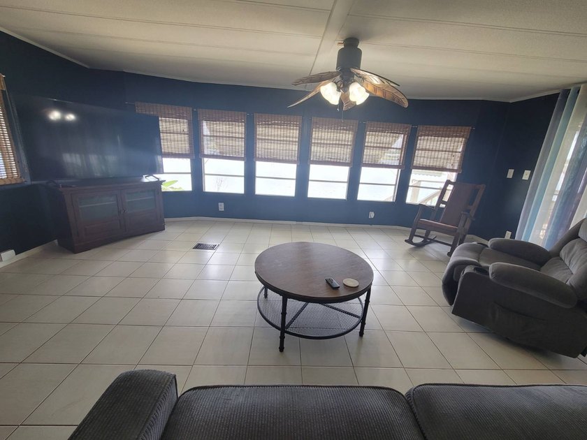 The property features a New roof and tile flooring throughout - photo 22