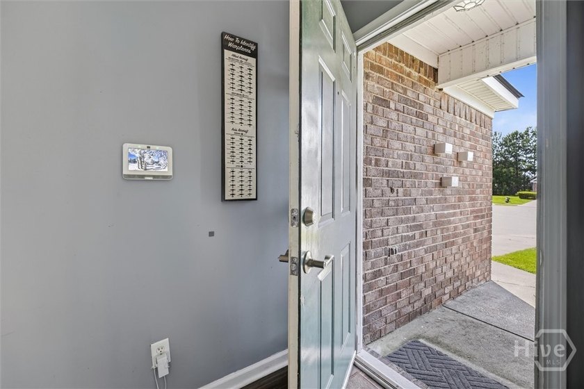 Welcome to this charming one-story home tucked away on a quiet - photo 3