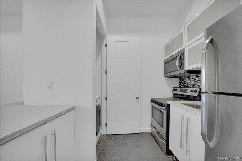 Exceptional opportunity to acquire a comprehensively renovated - photo 26