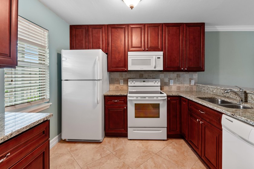 Remodeled 2 bedroom 2 bath second floor condo overlooking the - photo 3