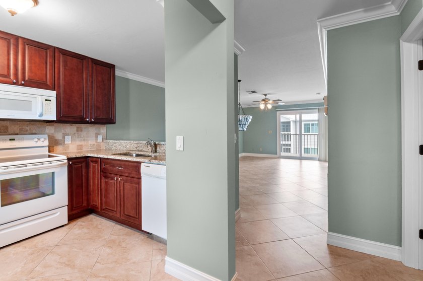 Remodeled 2 bedroom 2 bath second floor condo overlooking the - photo 4