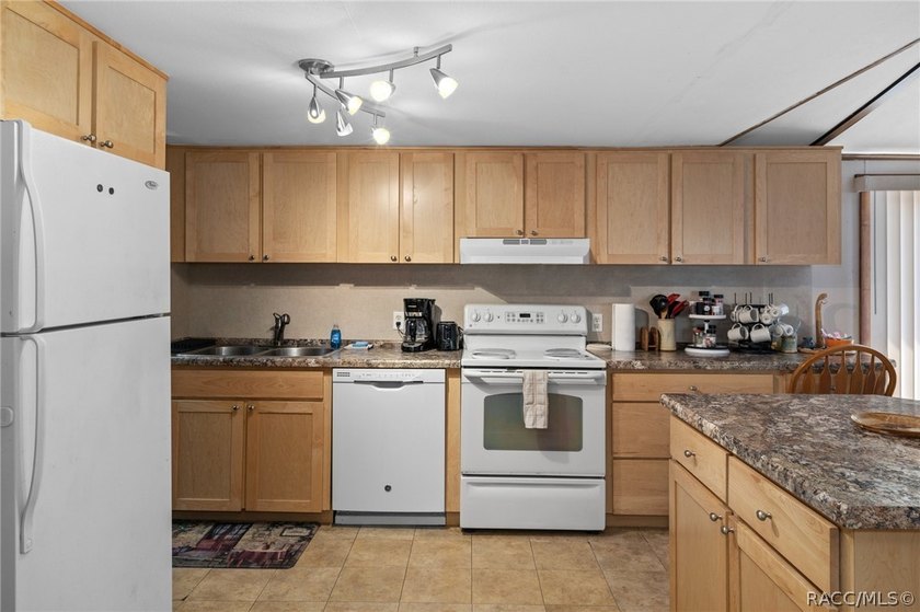 Welcome home to this charming 3-bedroom, 2-bathroom double wide - photo 18