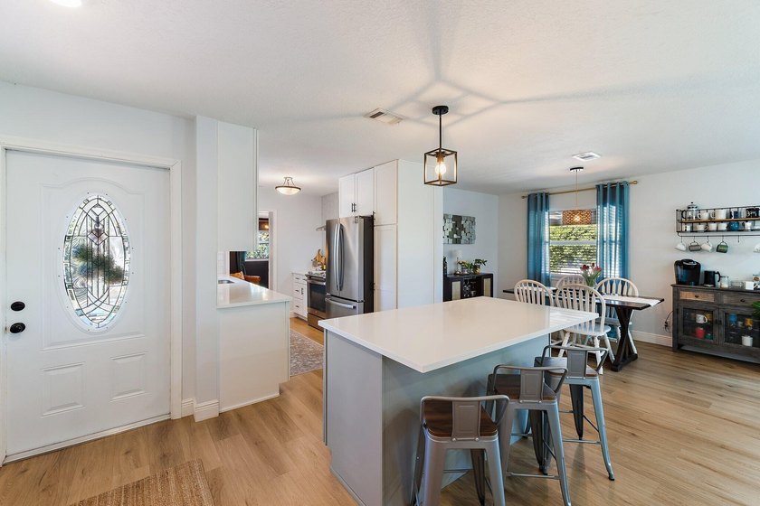 Positioned on an oversized corner lot in Lake Clarke Shores - photo 9