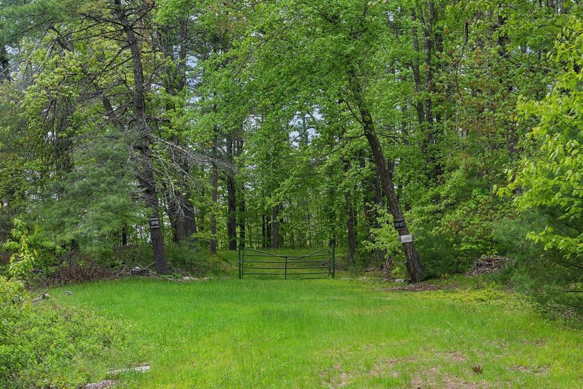Set in a prime location with breathtaking views of Mousam Lake - photo 3