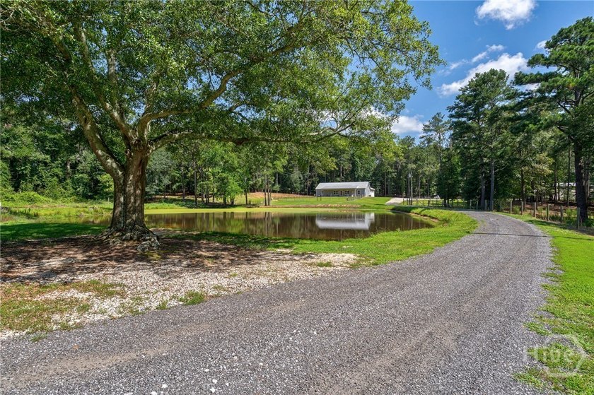 Set on 19.52 private acres, this thoughtfully designed 3-bedroom - photo 3