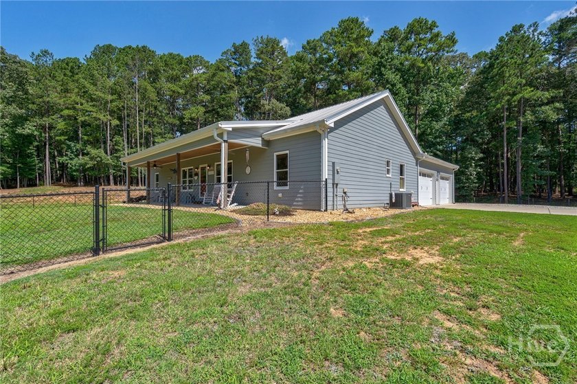 Set on 19.52 private acres, this thoughtfully designed 3-bedroom - photo 5