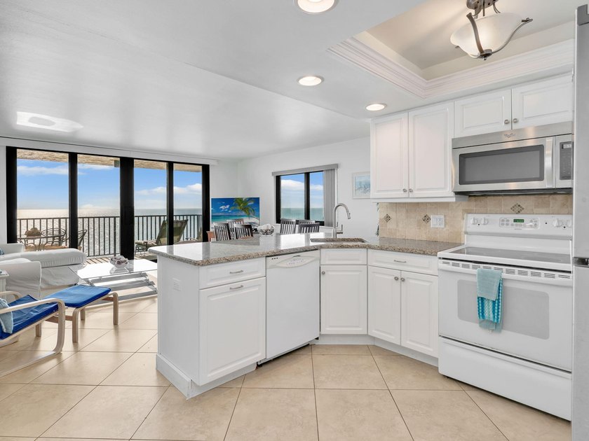 Experience luxury beachfront living from this highly - photo 8