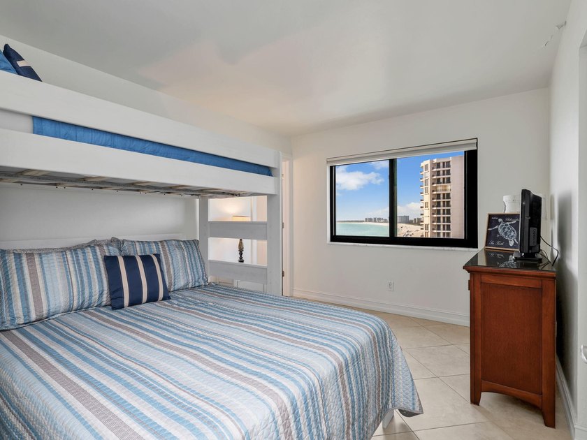 Experience luxury beachfront living from this highly - photo 10