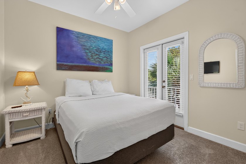 Discover coastal living just steps from the sugar-white sands of - photo 19