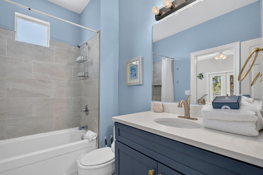 Discover coastal living just steps from the sugar-white sands of - photo 21