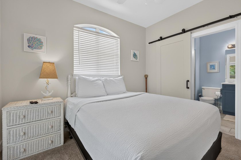 Discover coastal living just steps from the sugar-white sands of - photo 23