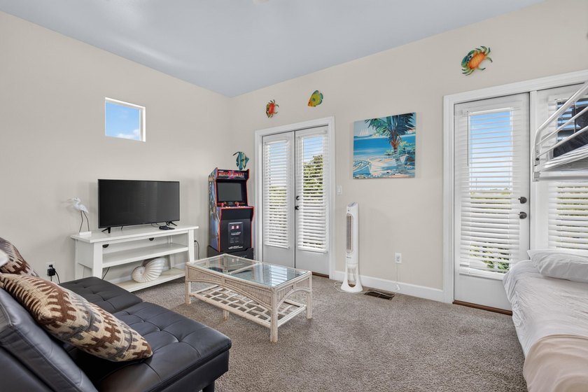 Discover coastal living just steps from the sugar-white sands of - photo 26