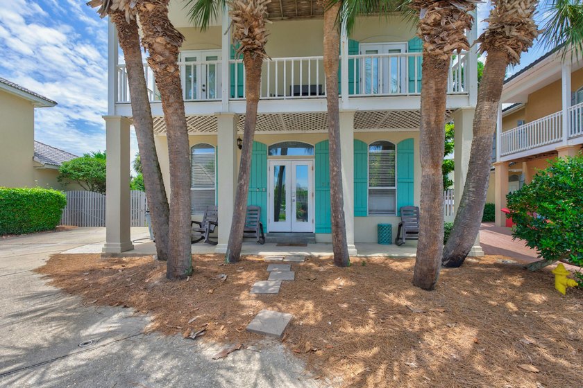 Discover coastal living just steps from the sugar-white sands of - photo 34