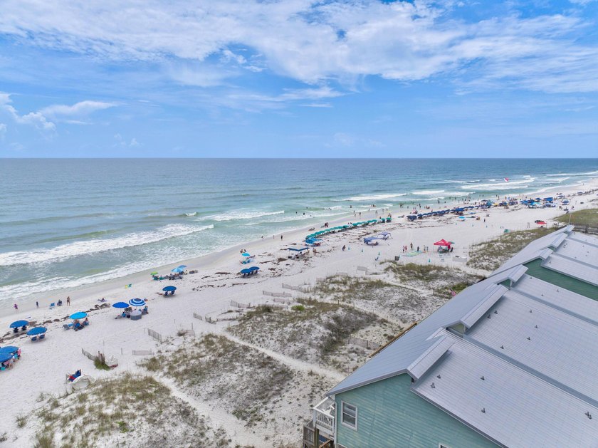 Discover coastal living just steps from the sugar-white sands of - photo 40
