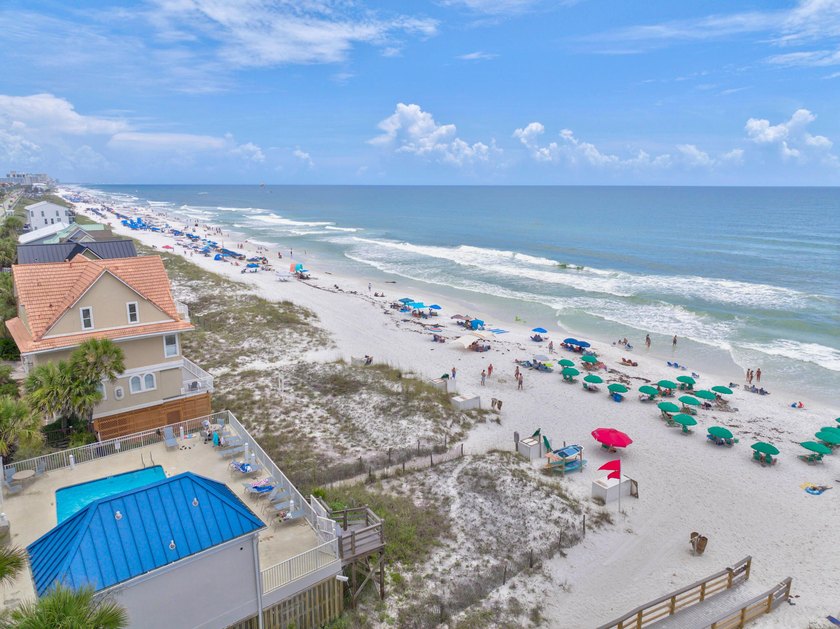 Discover coastal living just steps from the sugar-white sands of - photo 41