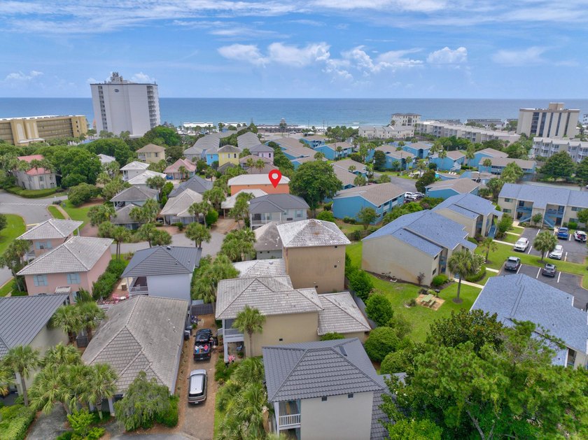 Discover coastal living just steps from the sugar-white sands of - photo 49