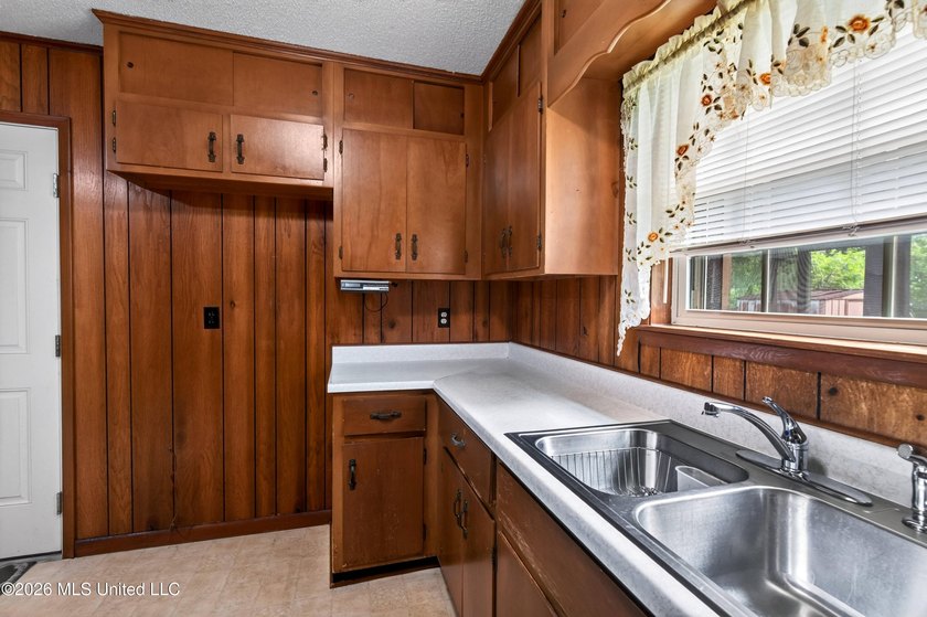 This charming all-brick 4-bedroom, 2-bath home has been lovingly - photo 13