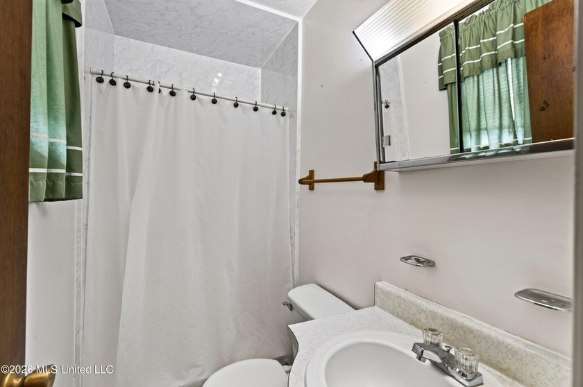 This charming all-brick 4-bedroom, 2-bath home has been lovingly - photo 16