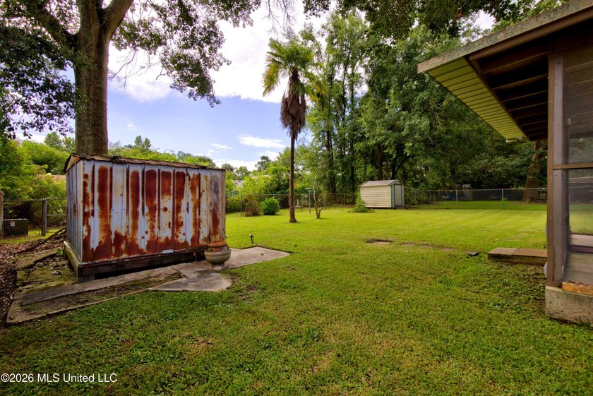 This charming all-brick 4-bedroom, 2-bath home has been lovingly - photo 23