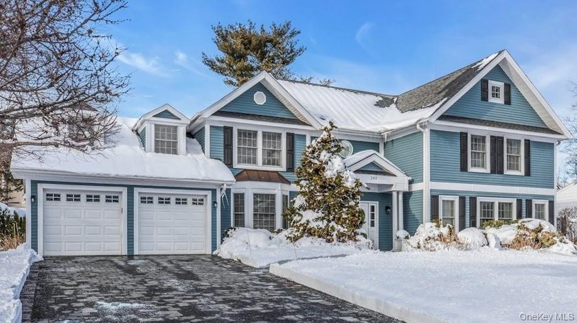This Flower Hill Center Hall Colonial spans 3,600 square feet - photo 2